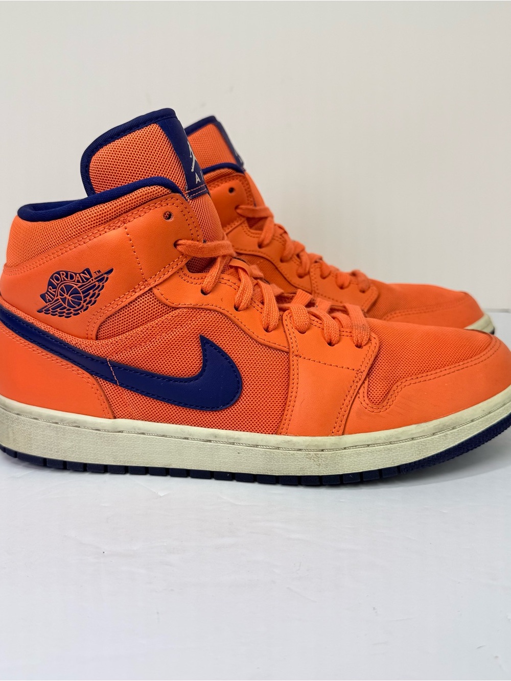 Air Jordan Mid-Top Sneakers in Orange with Navy Swoosh